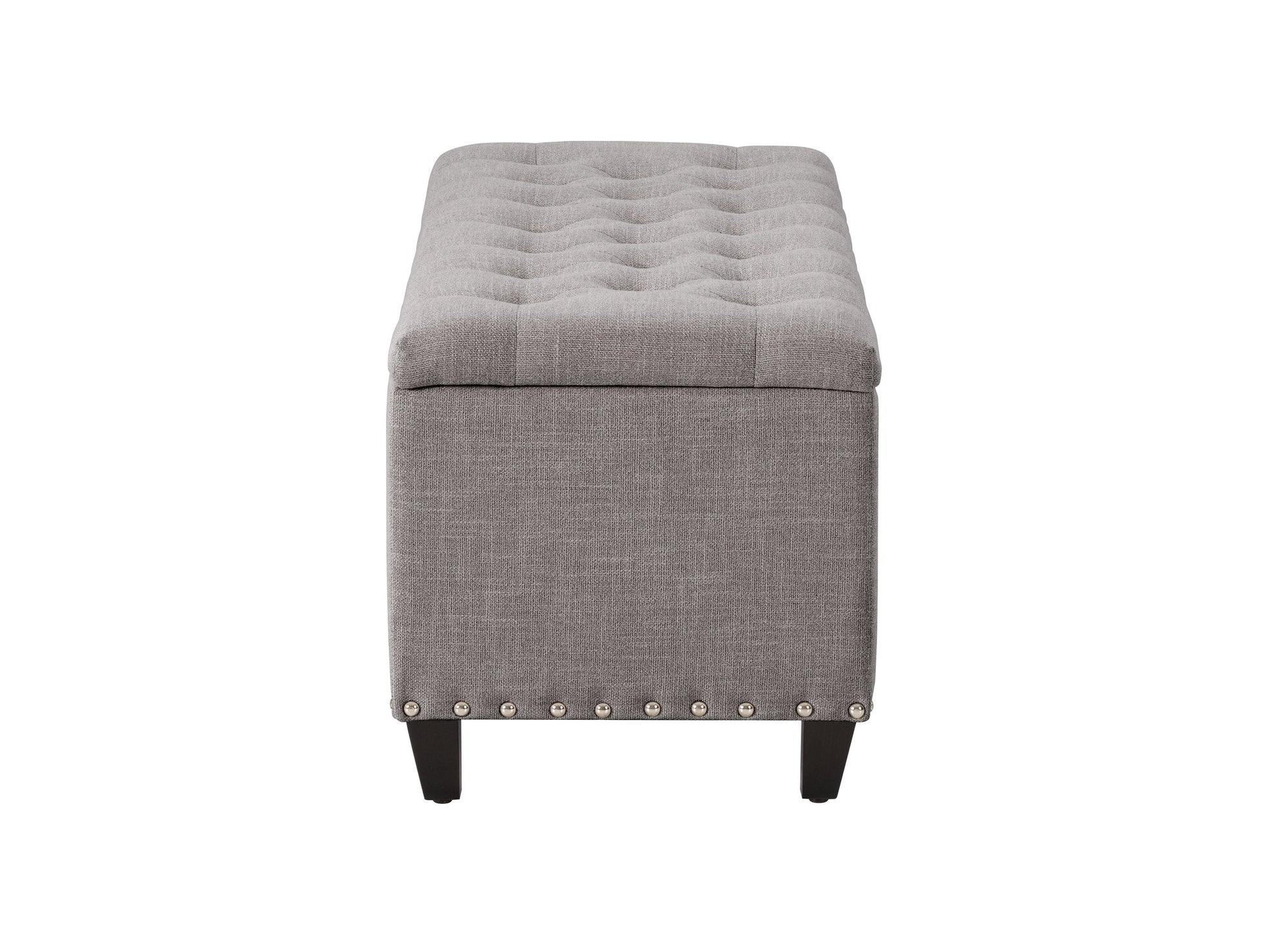 Light grey tufted storage ottoman with wooden legs and soft fabric upholstery.