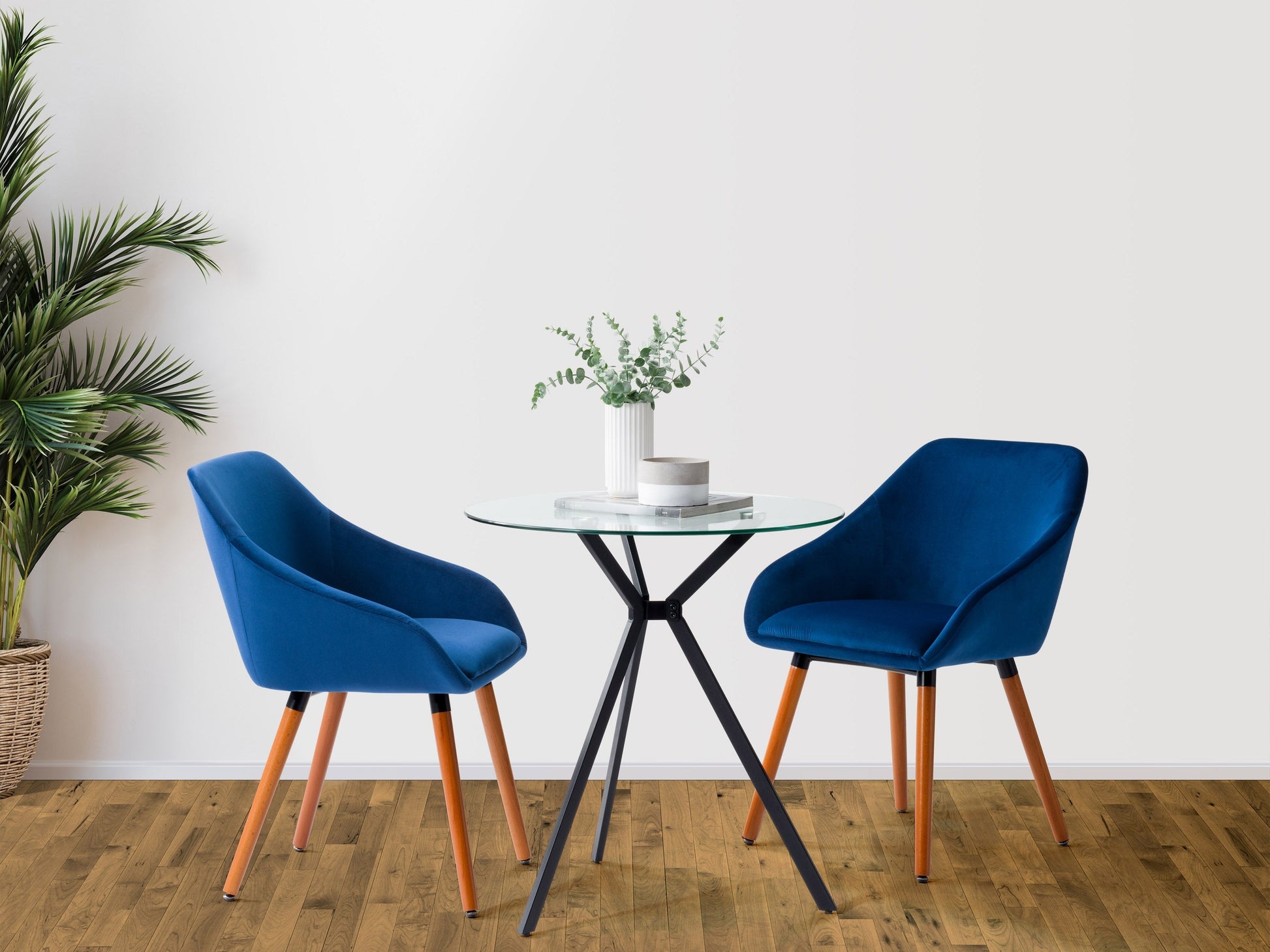 Navy blue velvet dining chairs set with gold metal legs and tufted backrest, elegant and modern design.