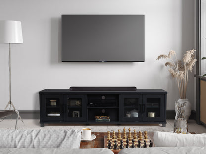 Black TV stand for up to 95" TVs, sleek design with open shelves and cable management.