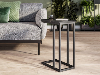 Black marble narrow side table with sleek gold metal legs and a minimalist design.