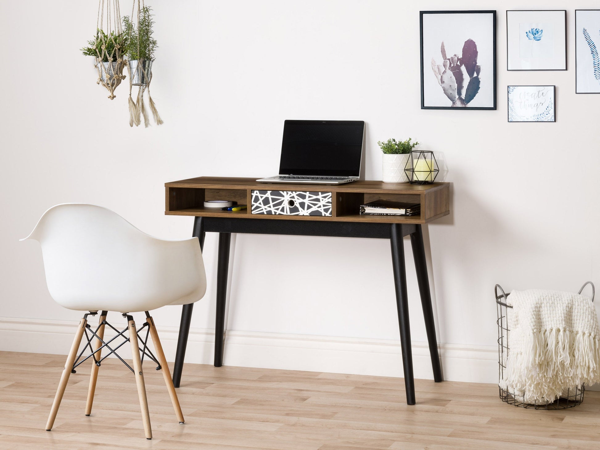 Mid-century modern desk in brown and black with sleek lines, wooden surface, and metal legs.