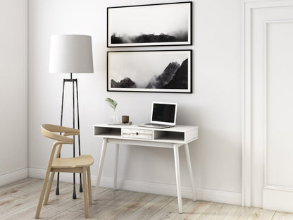 Mid-century white desk with sleek wooden legs, minimalist design, and spacious surface for home office or study.