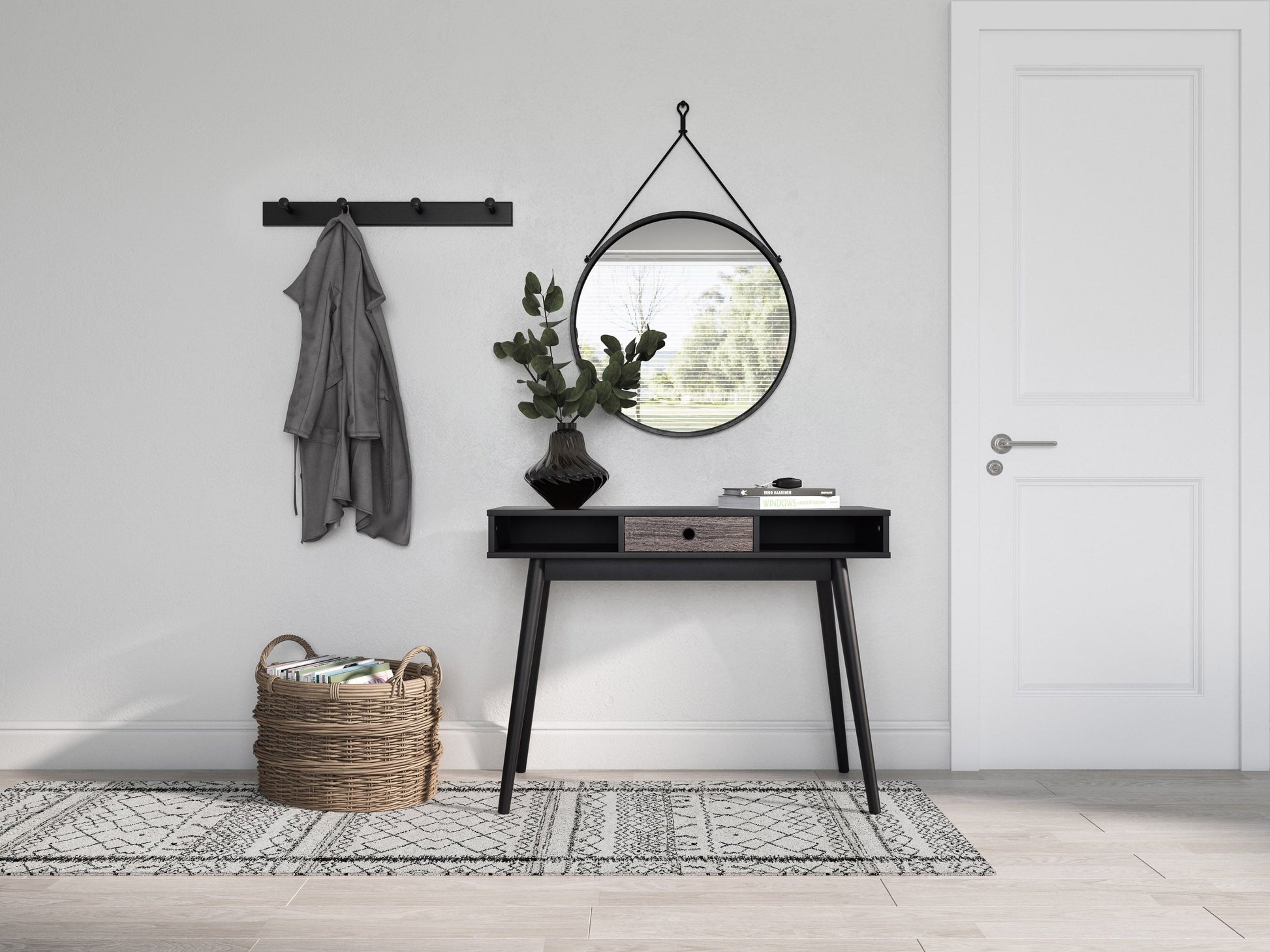 Black mid-century desk with sleek design, wooden legs, and spacious surface for home office or study.