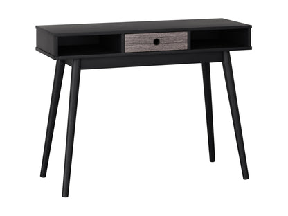 Black mid-century desk with sleek wooden legs, minimalist design, and spacious surface for home office.