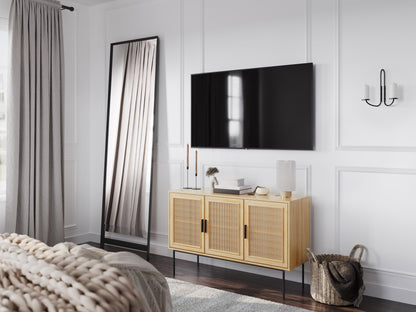 Light brown wood sideboard buffet with sliding doors and ample storage, featuring a sleek, modern design.