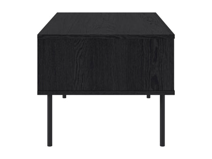 Black fluted coffee table with textured cylindrical base and smooth round top, modern minimalist design.