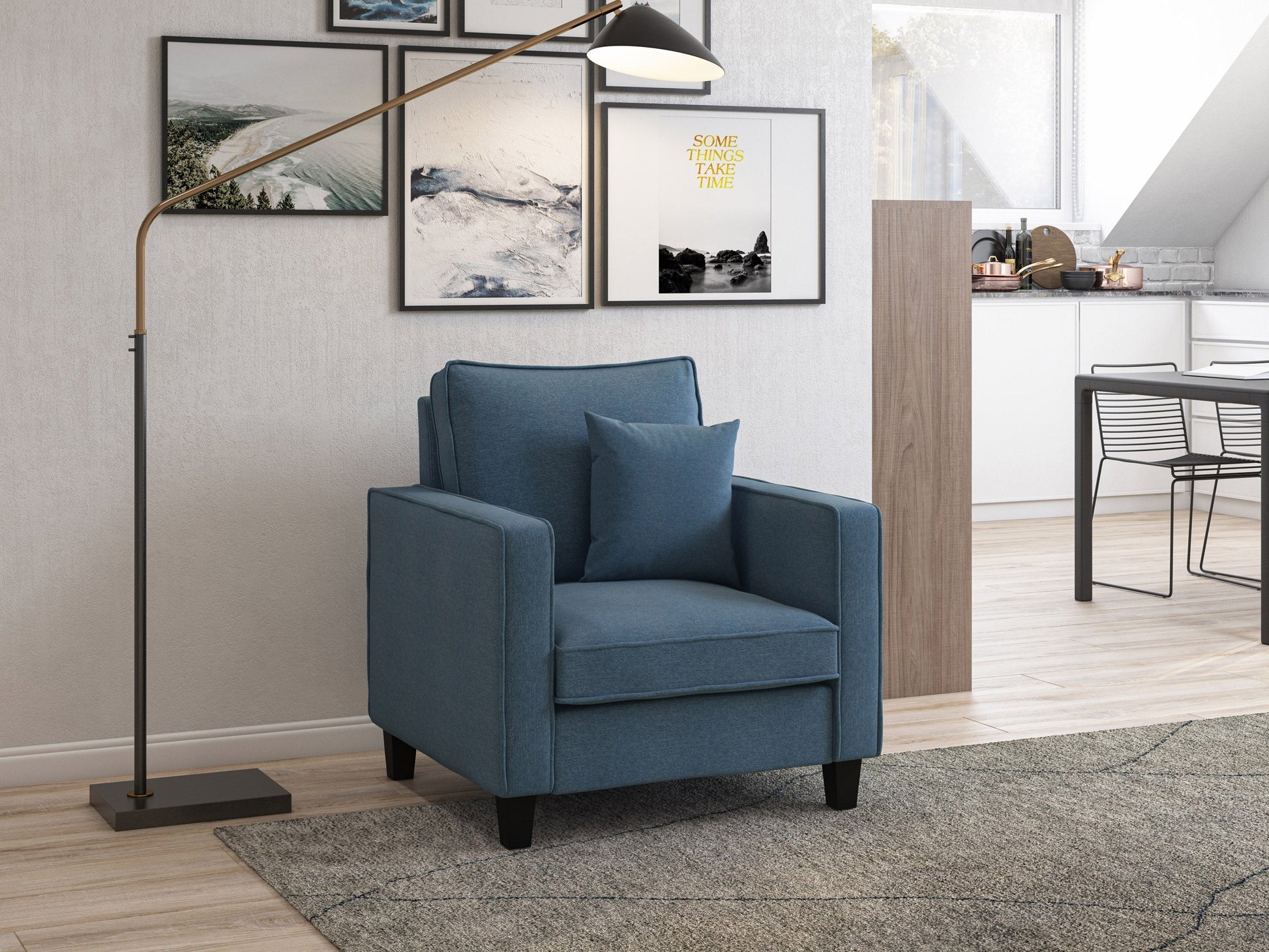 Mid-century modern blue armchair with wooden legs, tufted cushions, and sleek design.