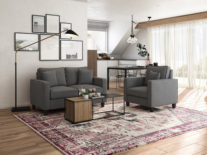 Grey 2 seater loveseat and chair set with fabric upholstery, wooden legs, and tufted cushions for modern living rooms.