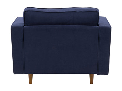 Navy blue mid-century modern arm chair with wooden legs and tufted cushions.