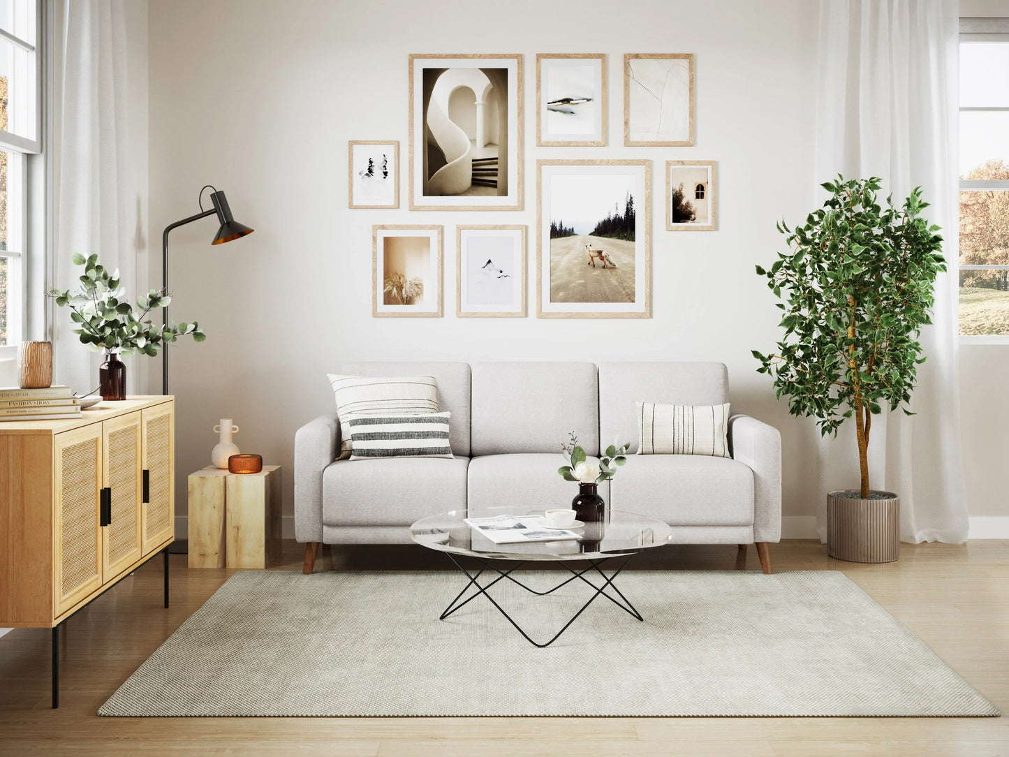 Modern gray fabric sofa with wooden legs, tufted backrest, and plush cushions, set in a contemporary living room with a light-colored rug and a coffee table.