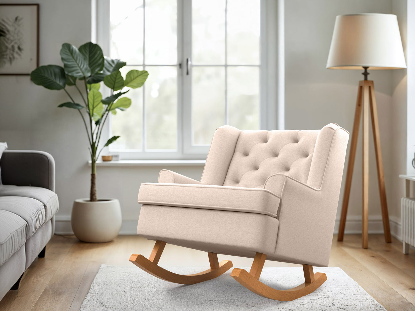 Beige rocking chair with wooden legs, padded seat, and backrest, perfect for modern living rooms or nurseries.