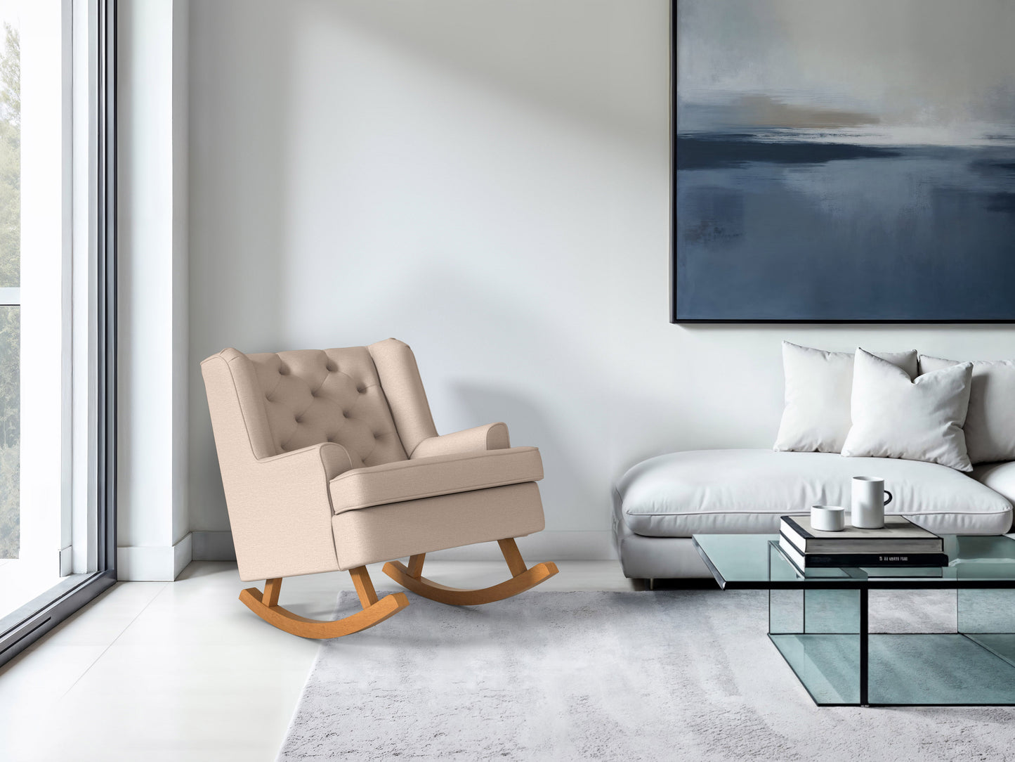 Beige rocking chair with wooden legs, cushioned seat, and backrest, perfect for a cozy, timeless living room setup.