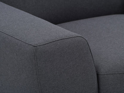 Dark grey 3 seater sofa with plush cushions, wooden legs, and modern minimalist design.