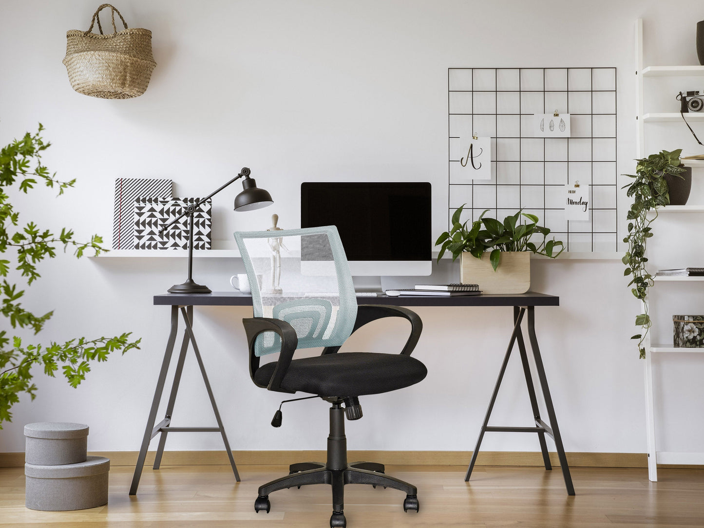 White mesh back office chair with adjustable height, ergonomic design, and swivel base.