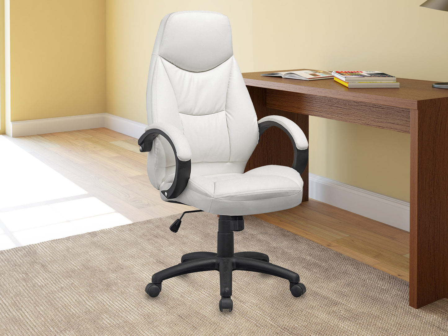 Ergonomic black office chair with lumbar support, adjustable armrests, breathable mesh back, and cushioned seat, ideal for home or office use.