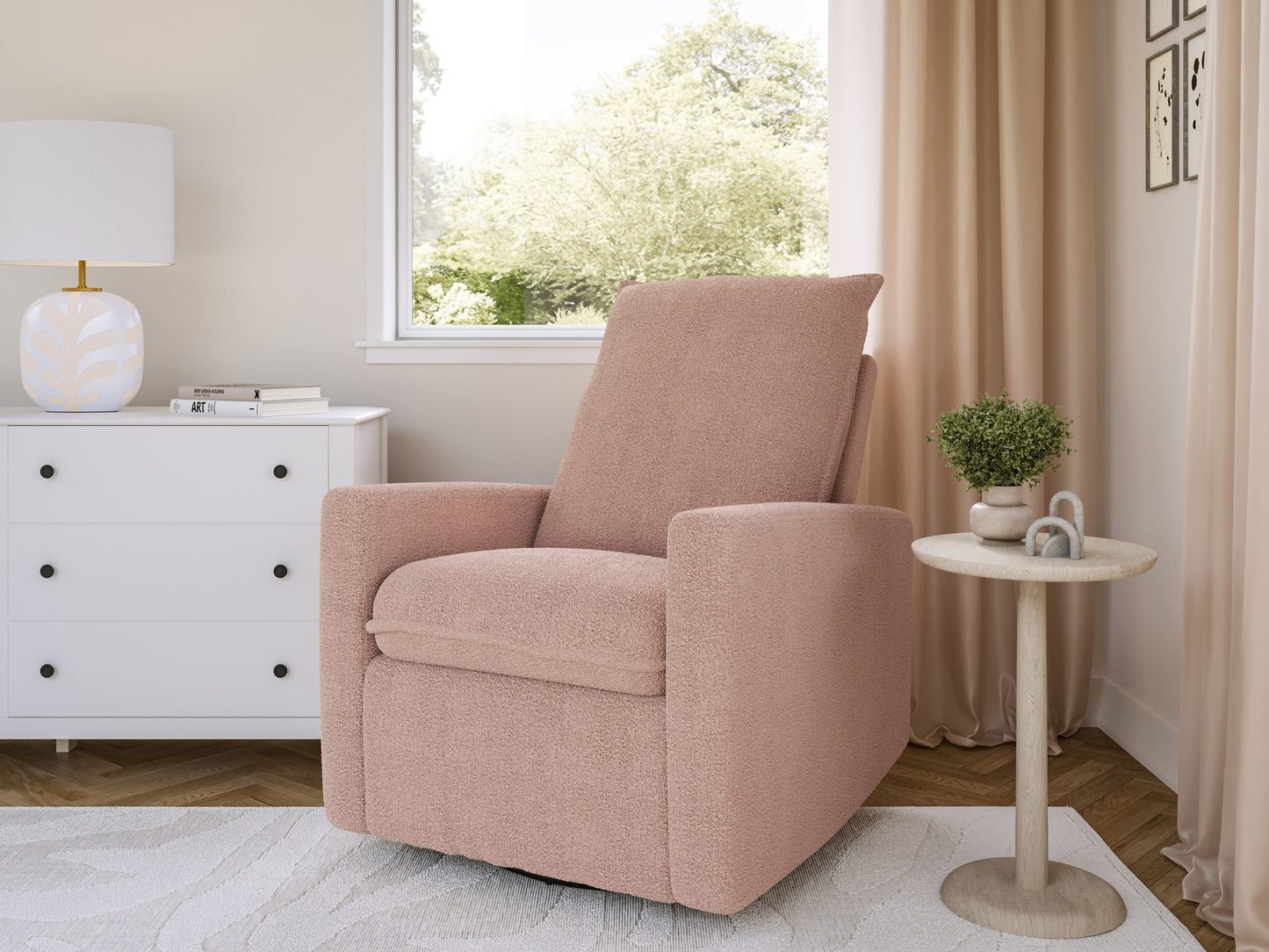 Pink boucle glider recliner chair with plush upholstery and modern design.