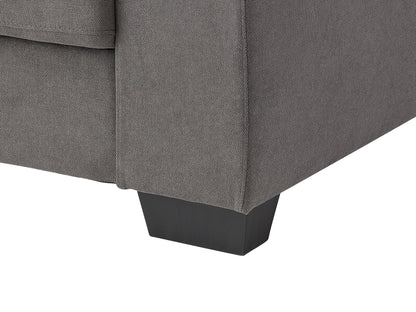 Dark grey arm chair with fabric upholstery, wooden legs, and tufted backrest for modern living rooms.