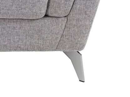 Light grey upholstered arm chair with wooden legs, tufted backrest, and contemporary design.