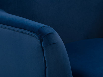 Blue modern wingback accent chair with tufted back, wooden legs, and soft fabric upholstery.