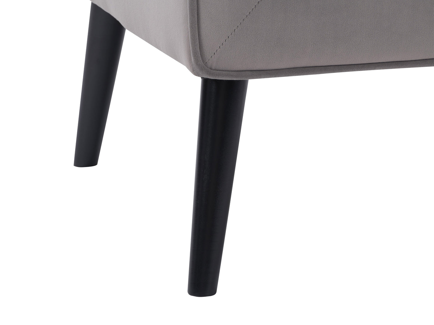 Grey velvet accent chair with tufted backrest, gold metal legs, and a modern design.