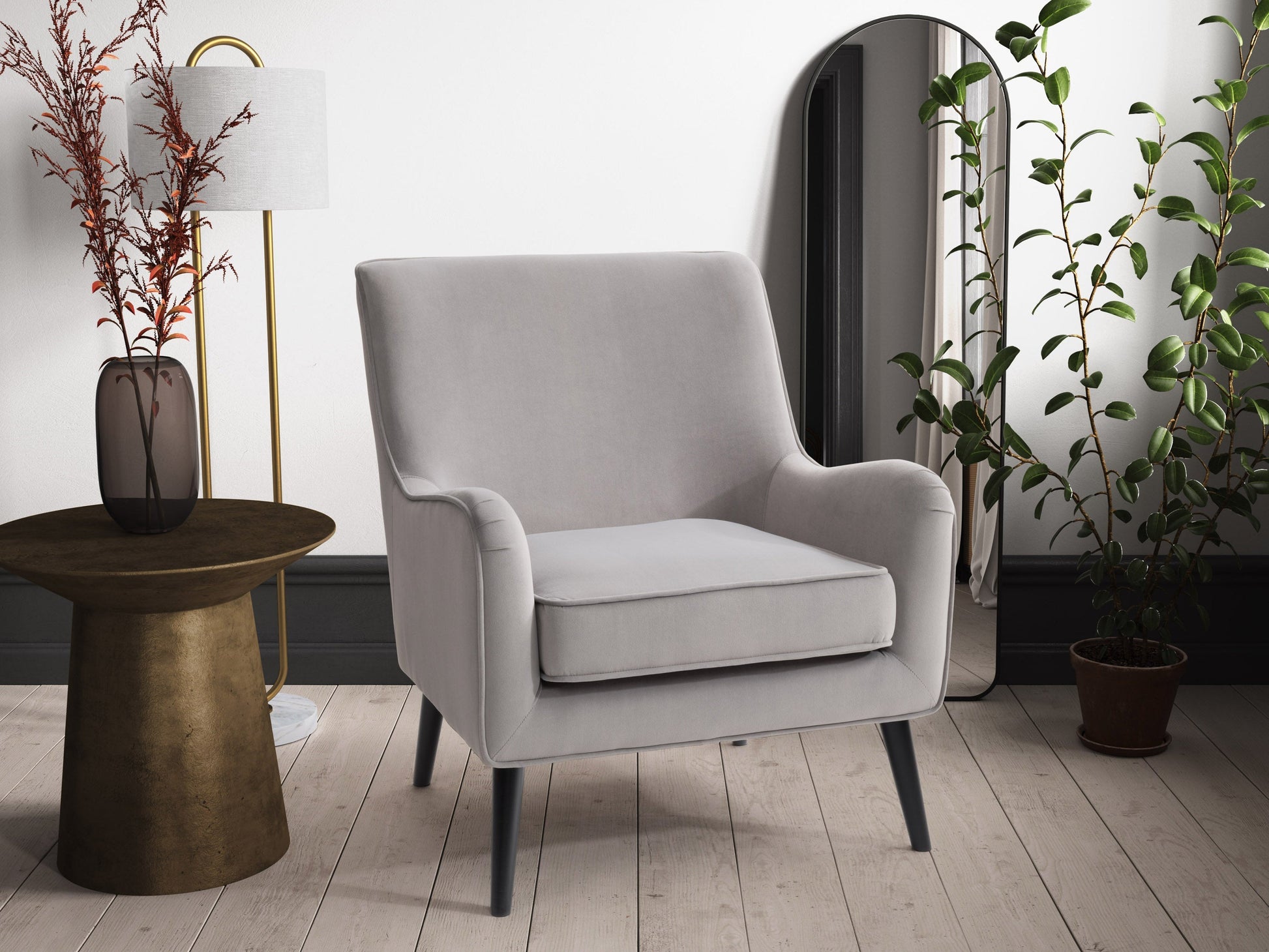 Grey velvet accent chair with tufted back, wooden legs, and modern design.