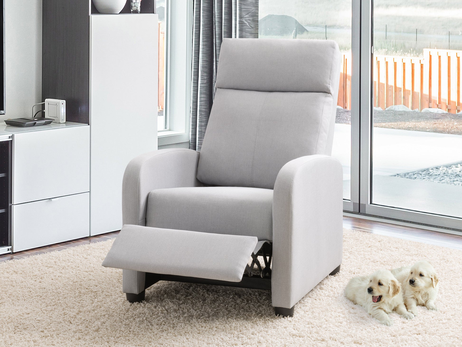 Grey fabric recliner chair with plush cushioning, sleek design, and adjustable backrest and footrest, perfect for living room comfort and relaxation.