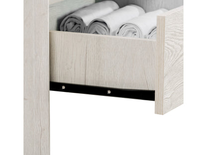 White washed oak tall bedroom dresser with sleek handles and multiple storage drawers.