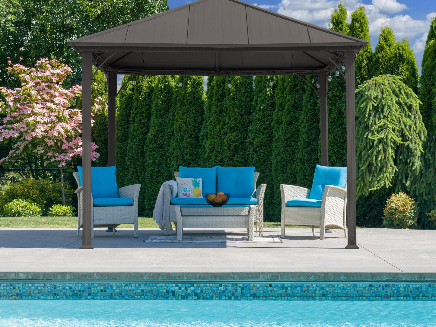 4 piece turquoise wicker patio set with cushions, featuring a loveseat, two chairs, and a coffee table for outdoor use.