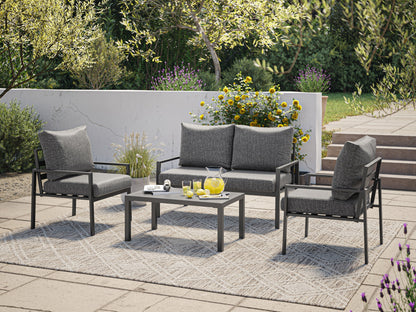 Deluxe grey 4-piece patio set with cushioned chairs, loveseat, and coffee table, featuring durable wicker and weather-resistant fabric.