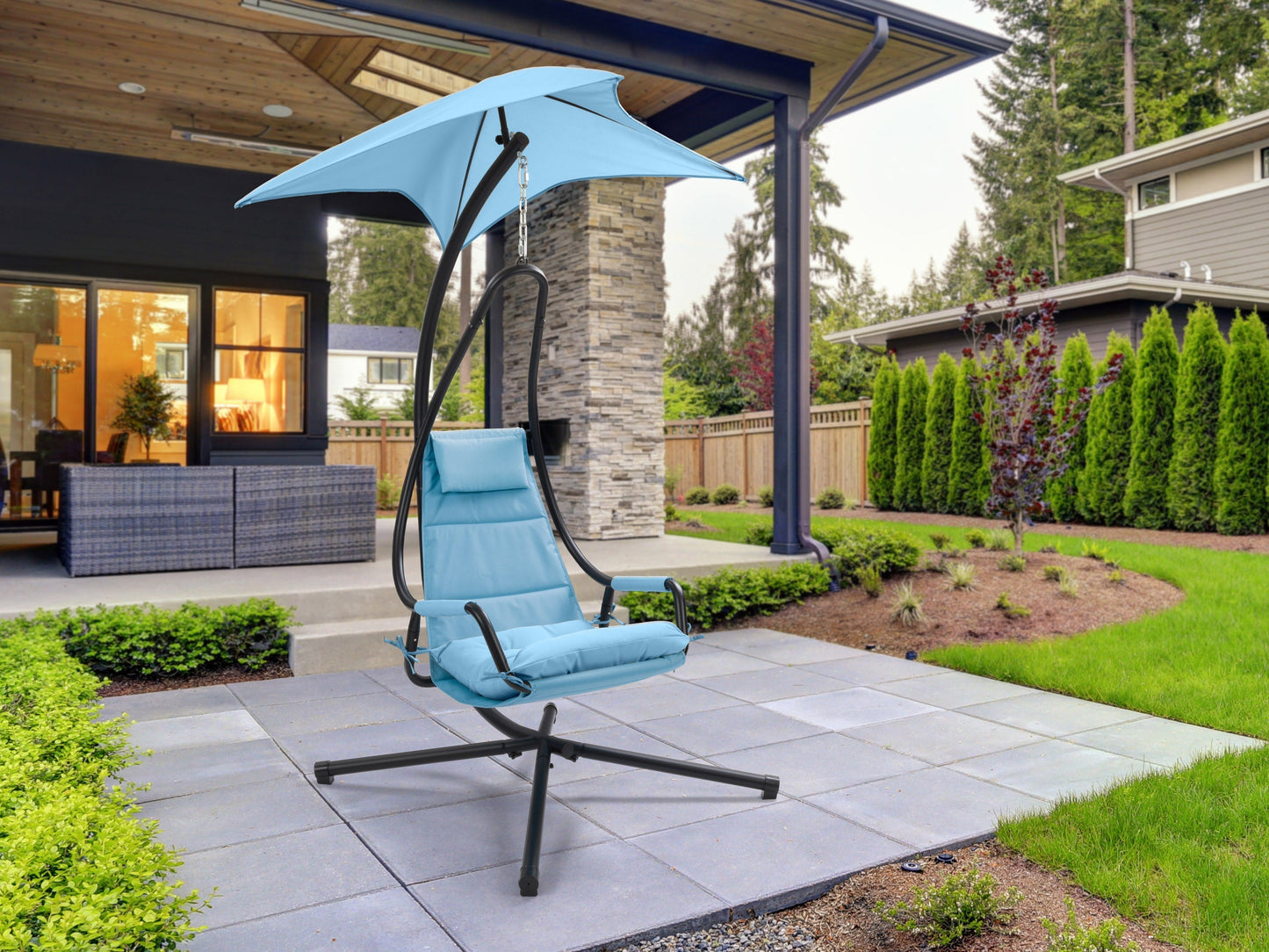 Light blue patio swing lounge chair with tufted cushions and sturdy metal frame.