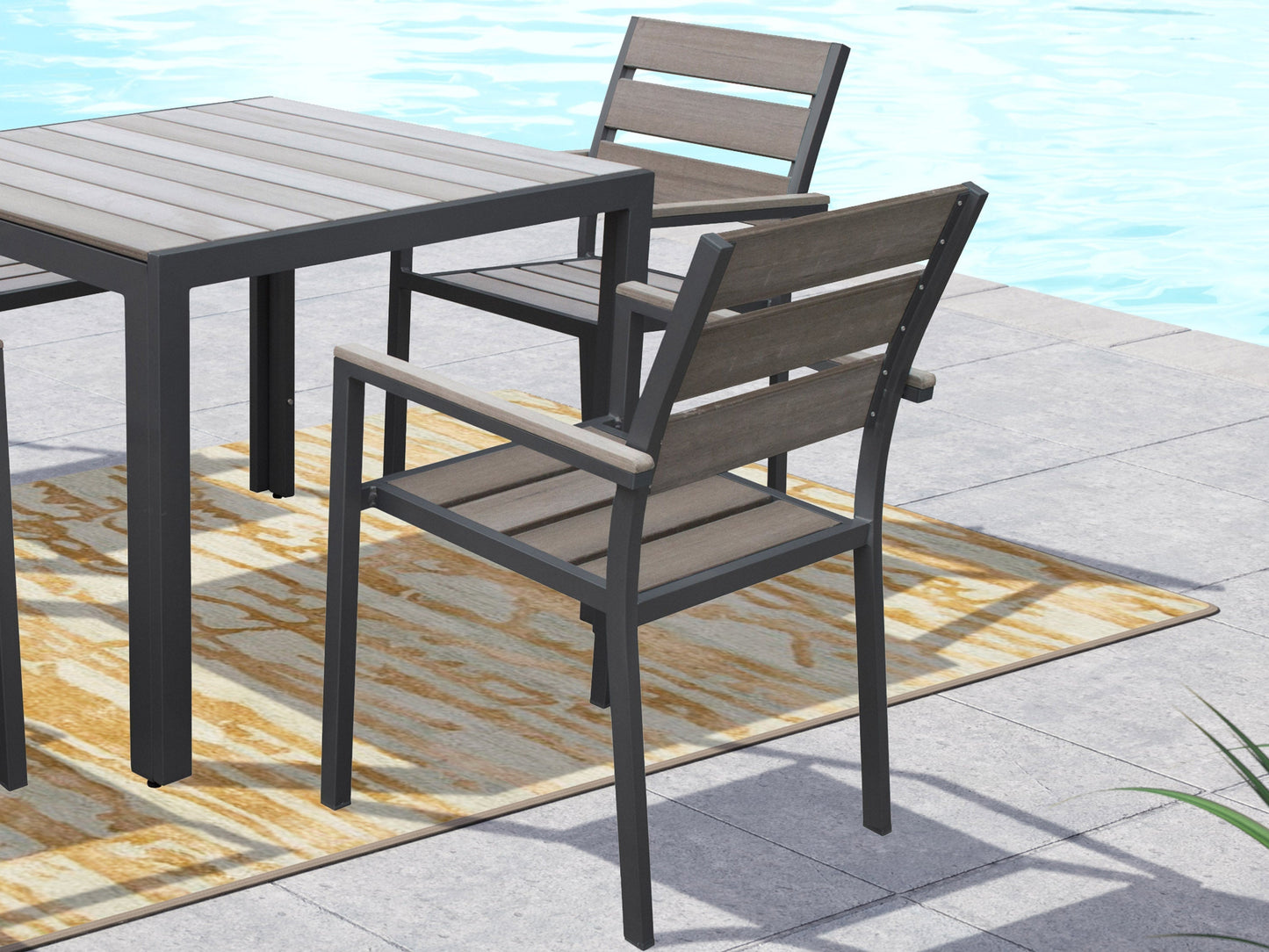 Charcoal grey patio dining chairs, set of 2, with weather-resistant cushions and sleek black metal frames.