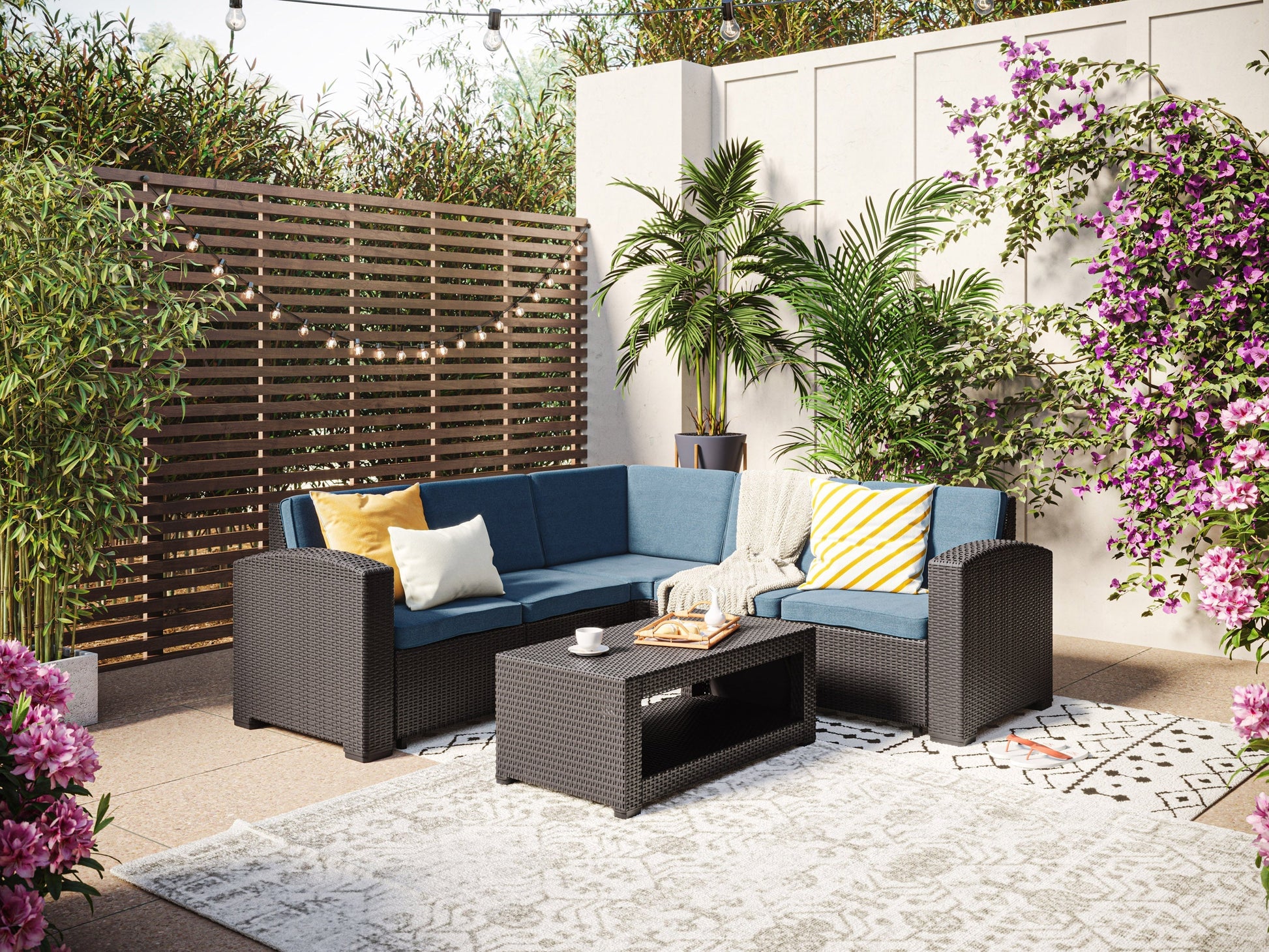 Black and blue outdoor wicker sectional set, 6-piece with cushions, modern patio furniture.