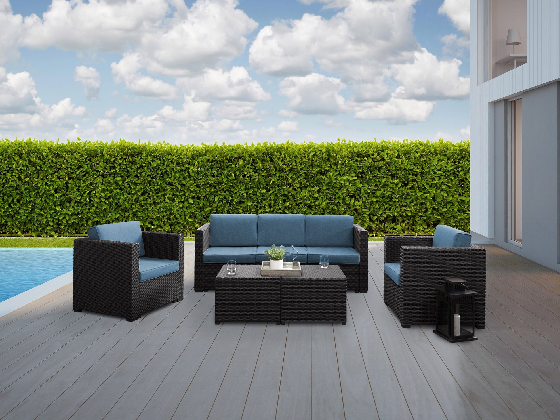 Black and blue 5pc patio conversation set with cushioned seats, metal frame, and glass-top coffee table.