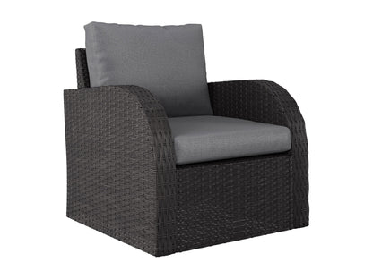 Grey outdoor wicker patio conversation set with cushioned chairs and glass-top table