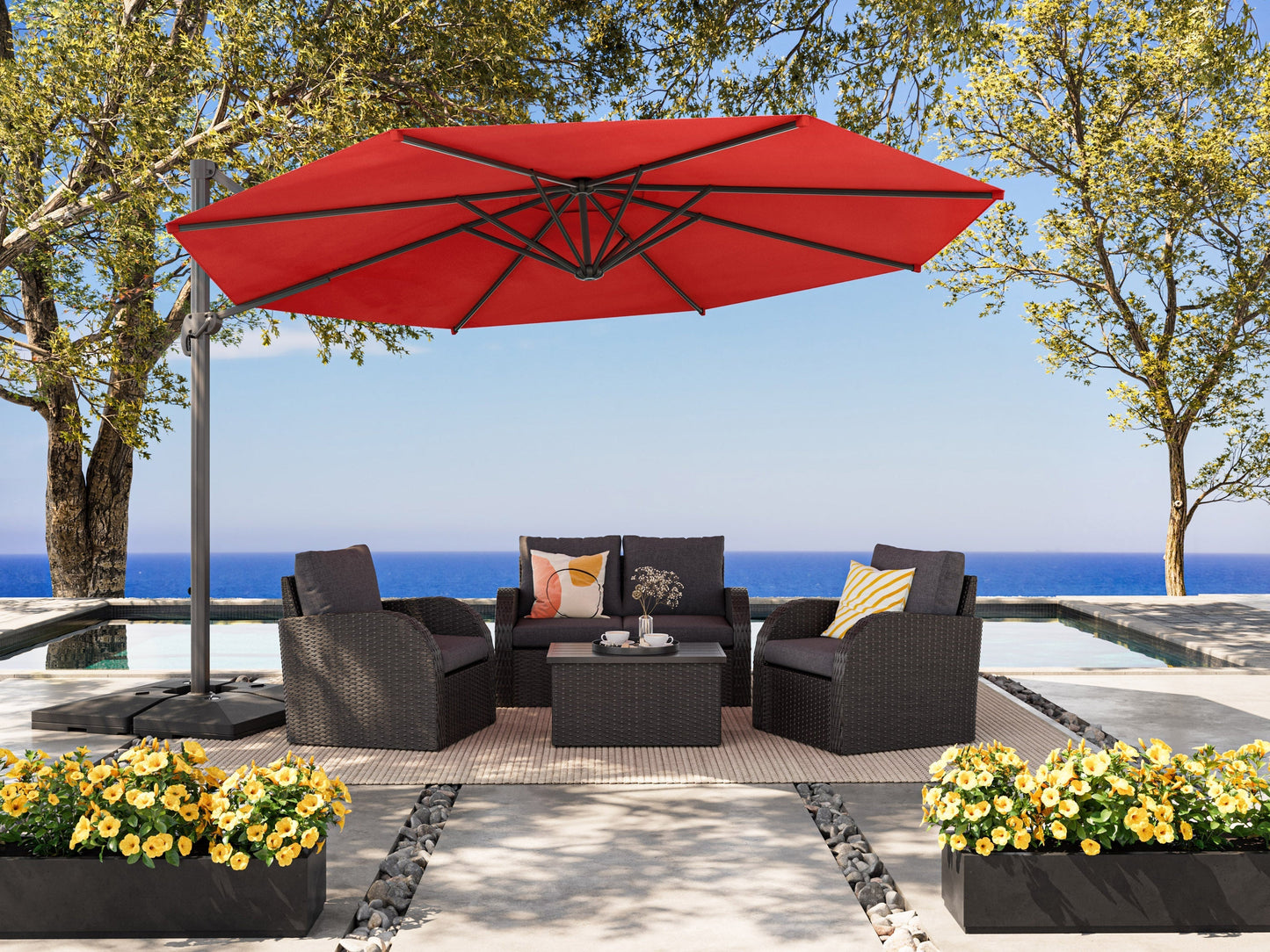 Grey patio conversation set with cushions, wicker frame, and glass-top table for outdoor seating.