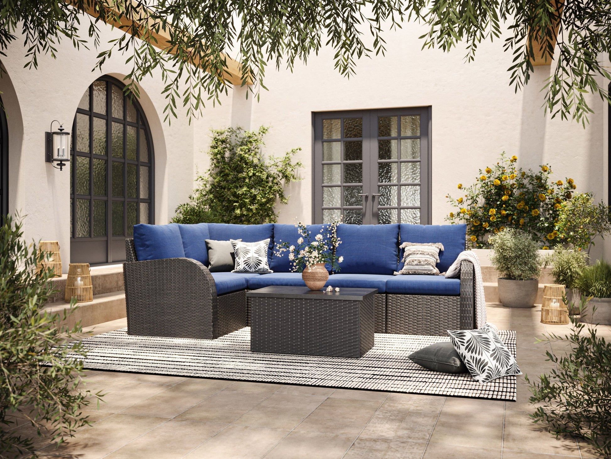 Blue outdoor sectional chair with left arm, featuring weather-resistant fabric, sleek aluminum frame, and comfortable cushions.