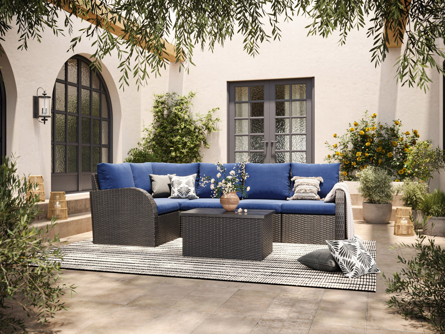 Blue outdoor sectional middle chair with weather-resistant cushions and a sturdy metal frame, perfect for patio seating.