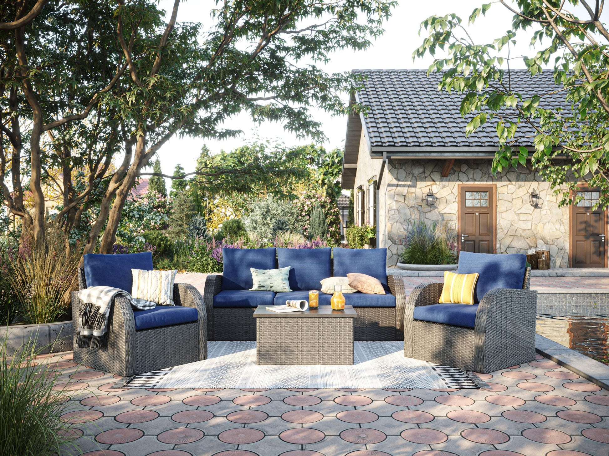 Outdoor patio conversation set, 6-piece, blue cushions, rattan wicker, glass-top coffee table, modern design.