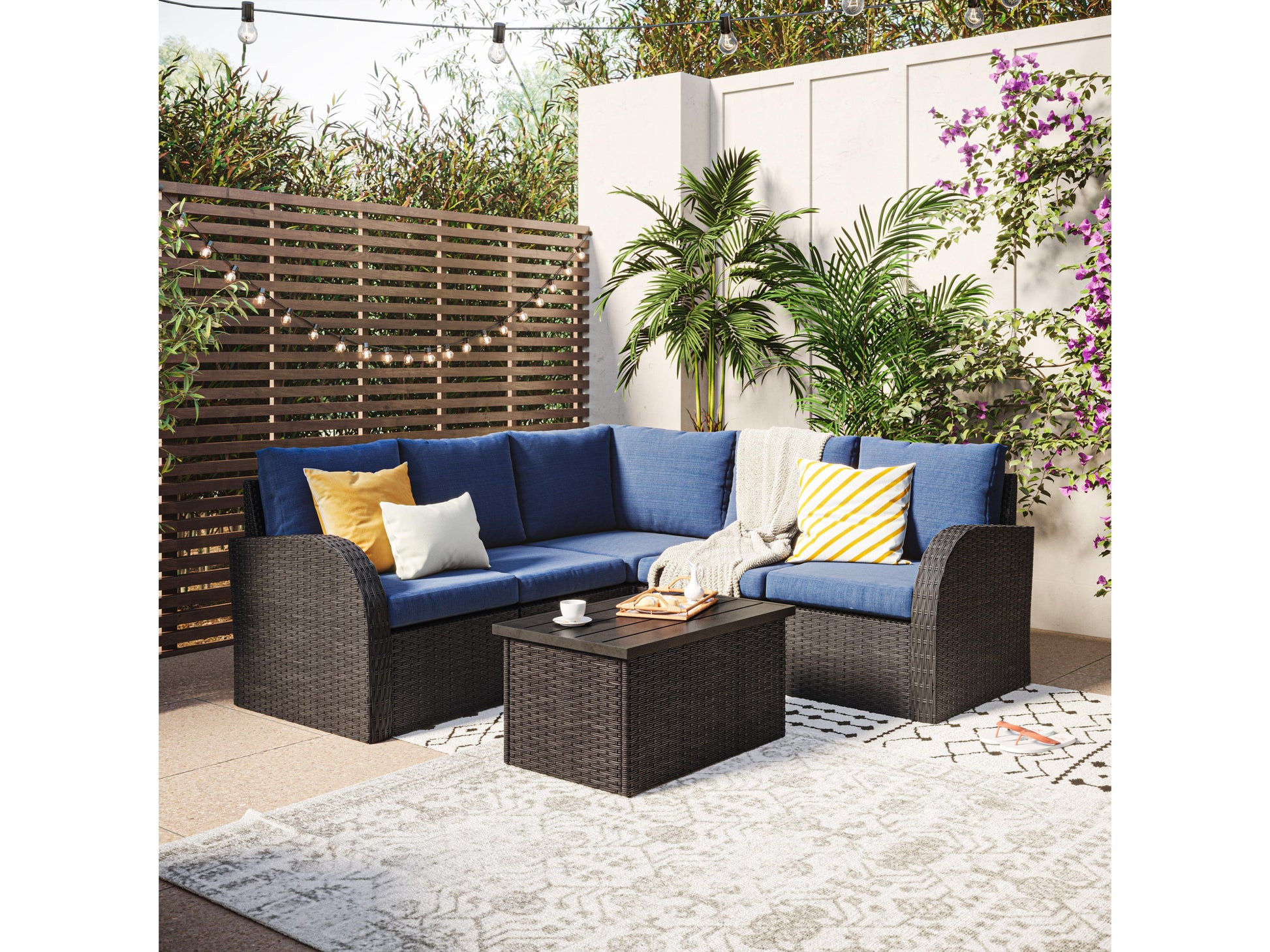 Blue outdoor wicker sectional set, 6-piece with cushions, modern patio furniture.