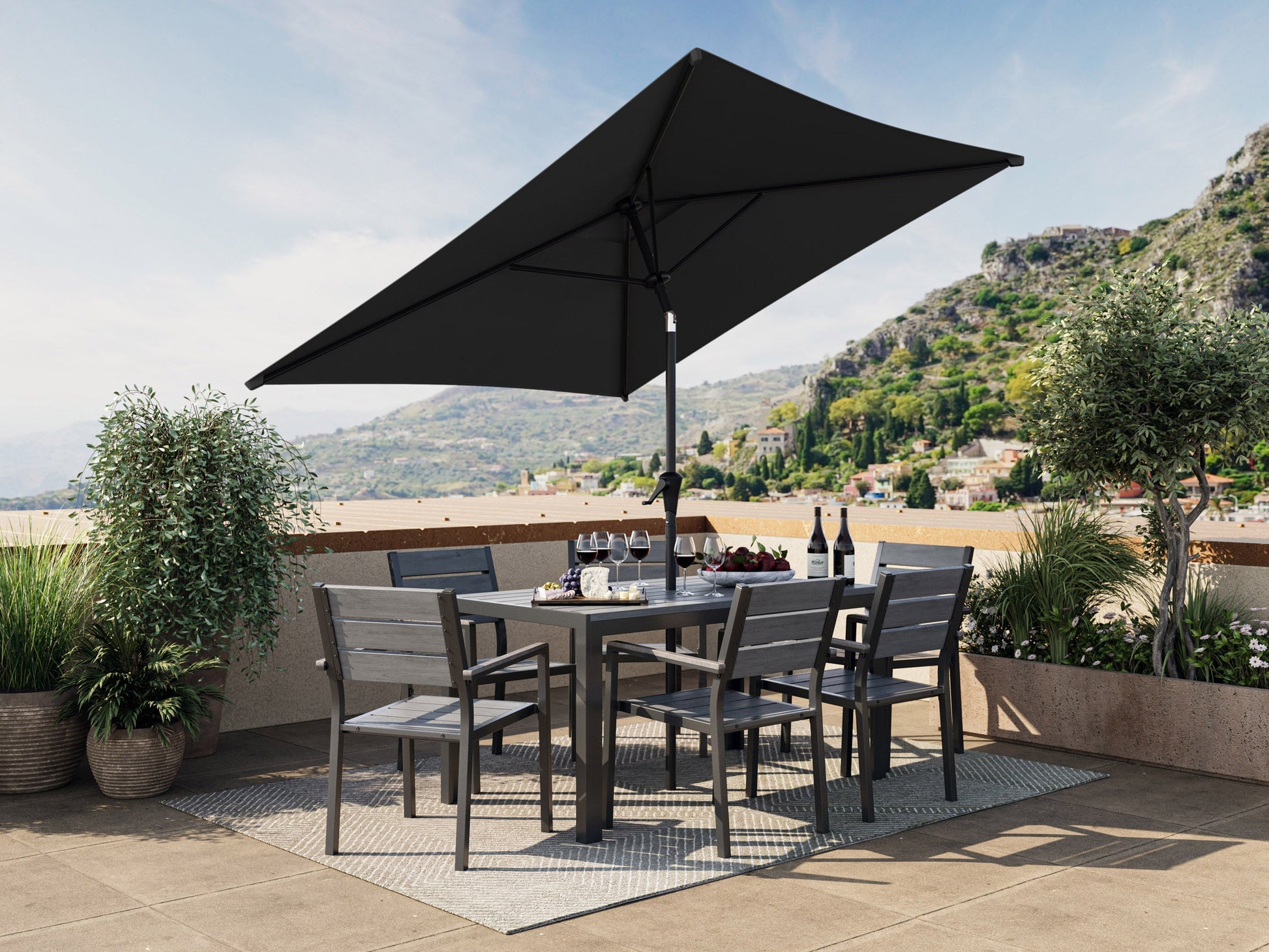 Black 9ft square patio umbrella with tilting feature, durable fabric, and sturdy pole for outdoor shade.