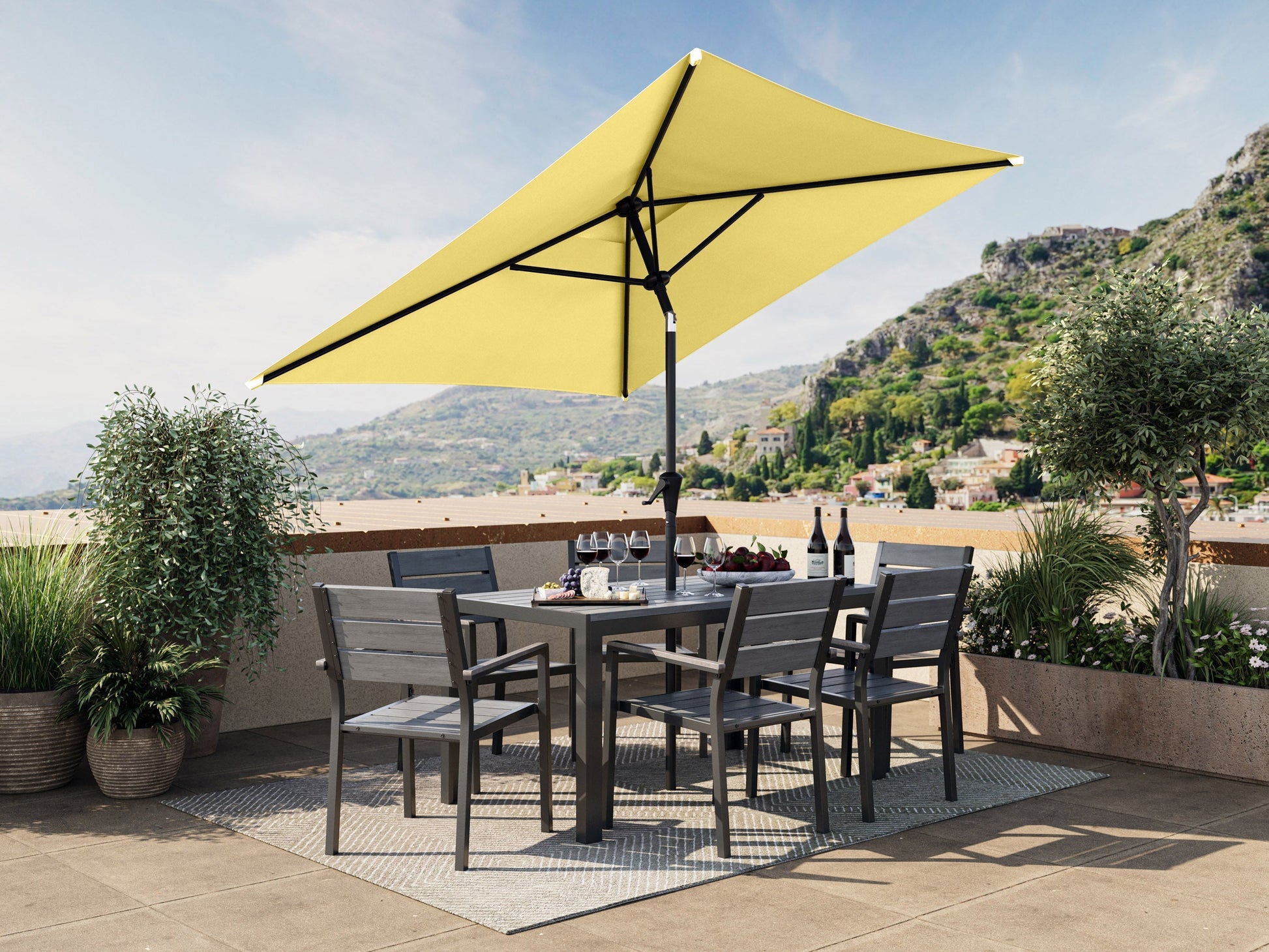 Yellow 9ft square patio umbrella with tilting feature, durable fabric, and sturdy metal pole for outdoor use.