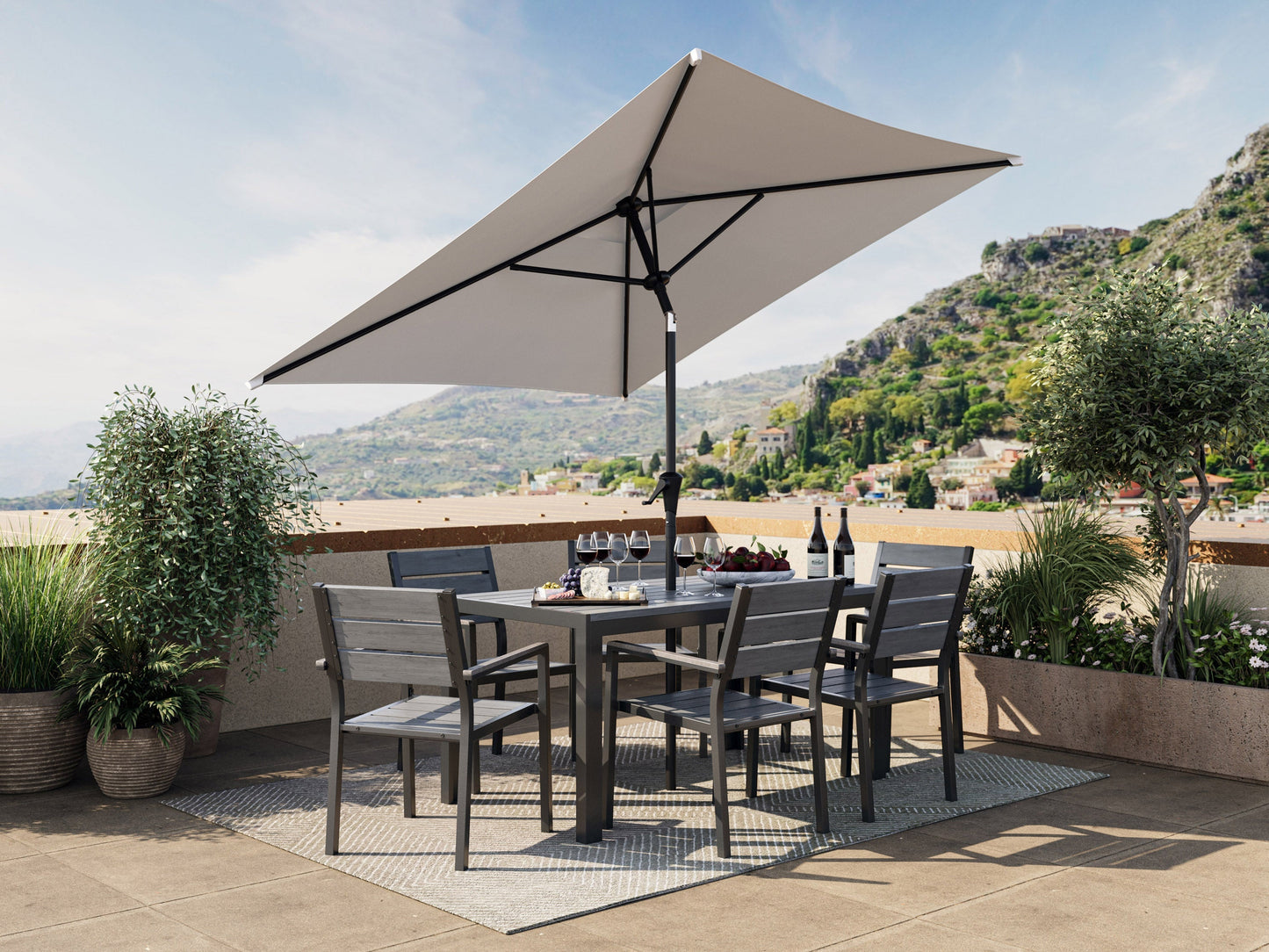 Grey 9ft square patio umbrella with tilting feature, durable fabric, and sturdy metal frame for outdoor use.