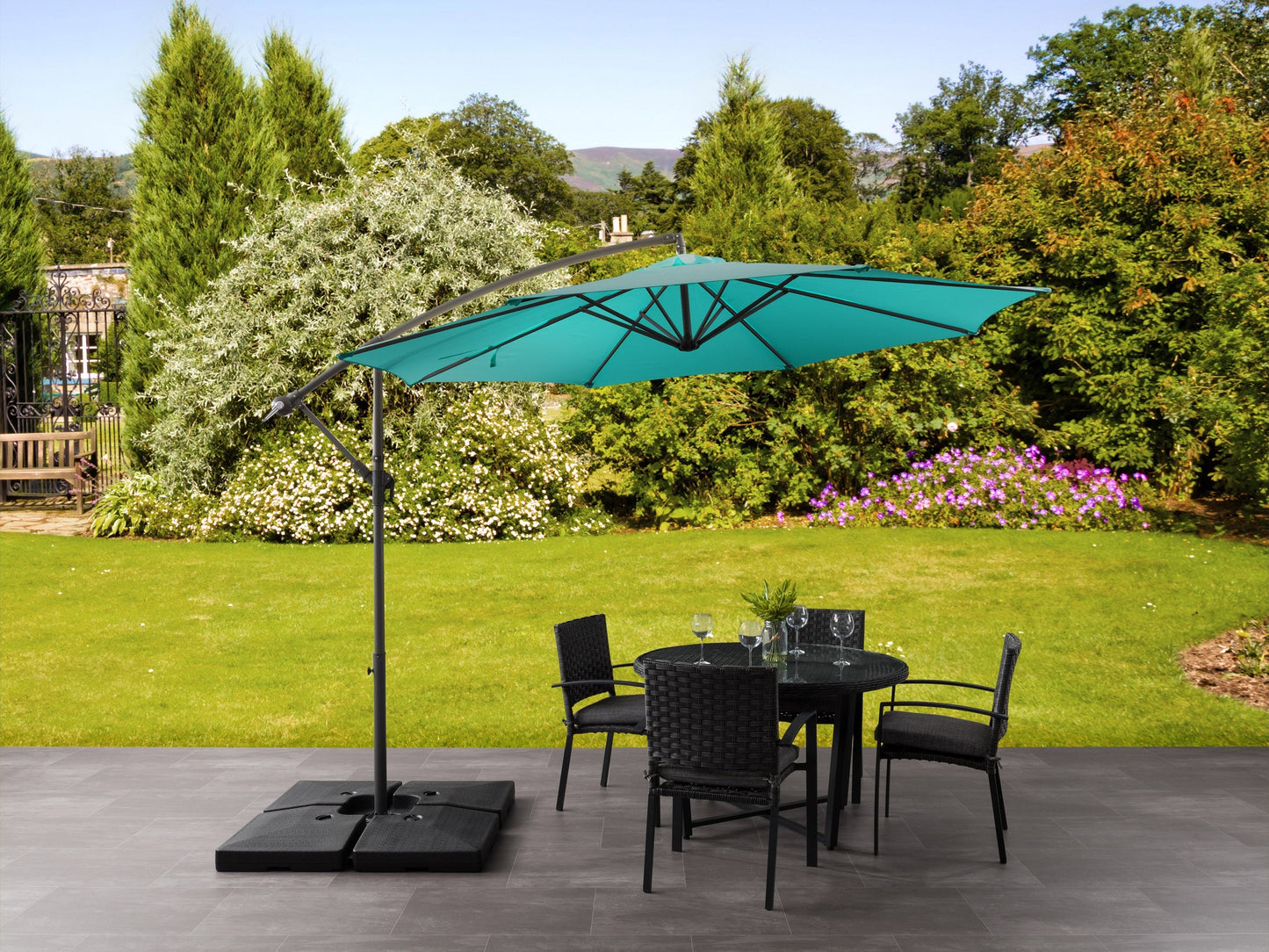 Turquoise 9.5ft tilting offset patio umbrella with sturdy aluminum frame and UV-resistant fabric.