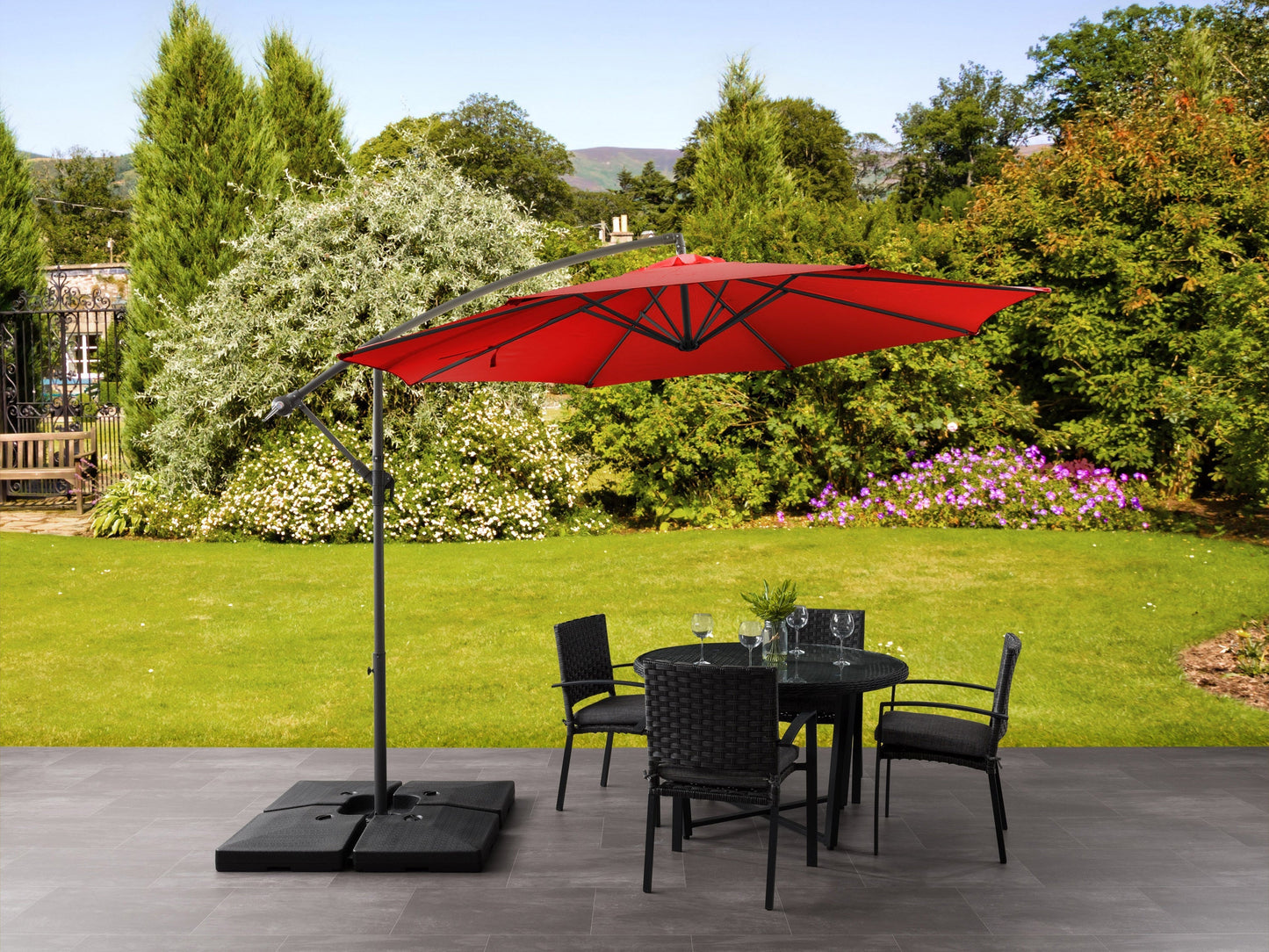 Crimson red 9.5ft tilting offset patio umbrella with durable fabric and adjustable canopy for outdoor shade.