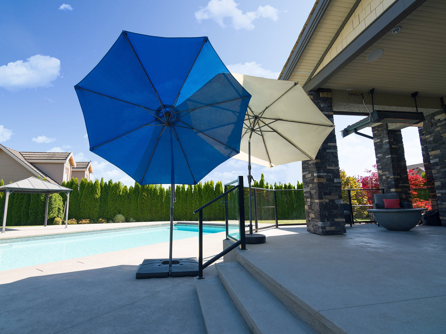 Cobalt blue 9.5ft tilting offset patio umbrella with UV protection and durable aluminum frame.