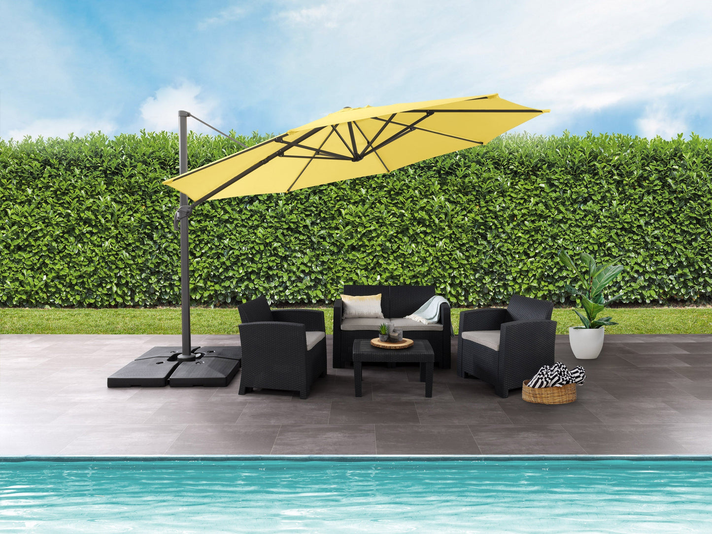 Yellow 11.5ft deluxe offset patio umbrella with sturdy base, UV protection, and adjustable canopy.