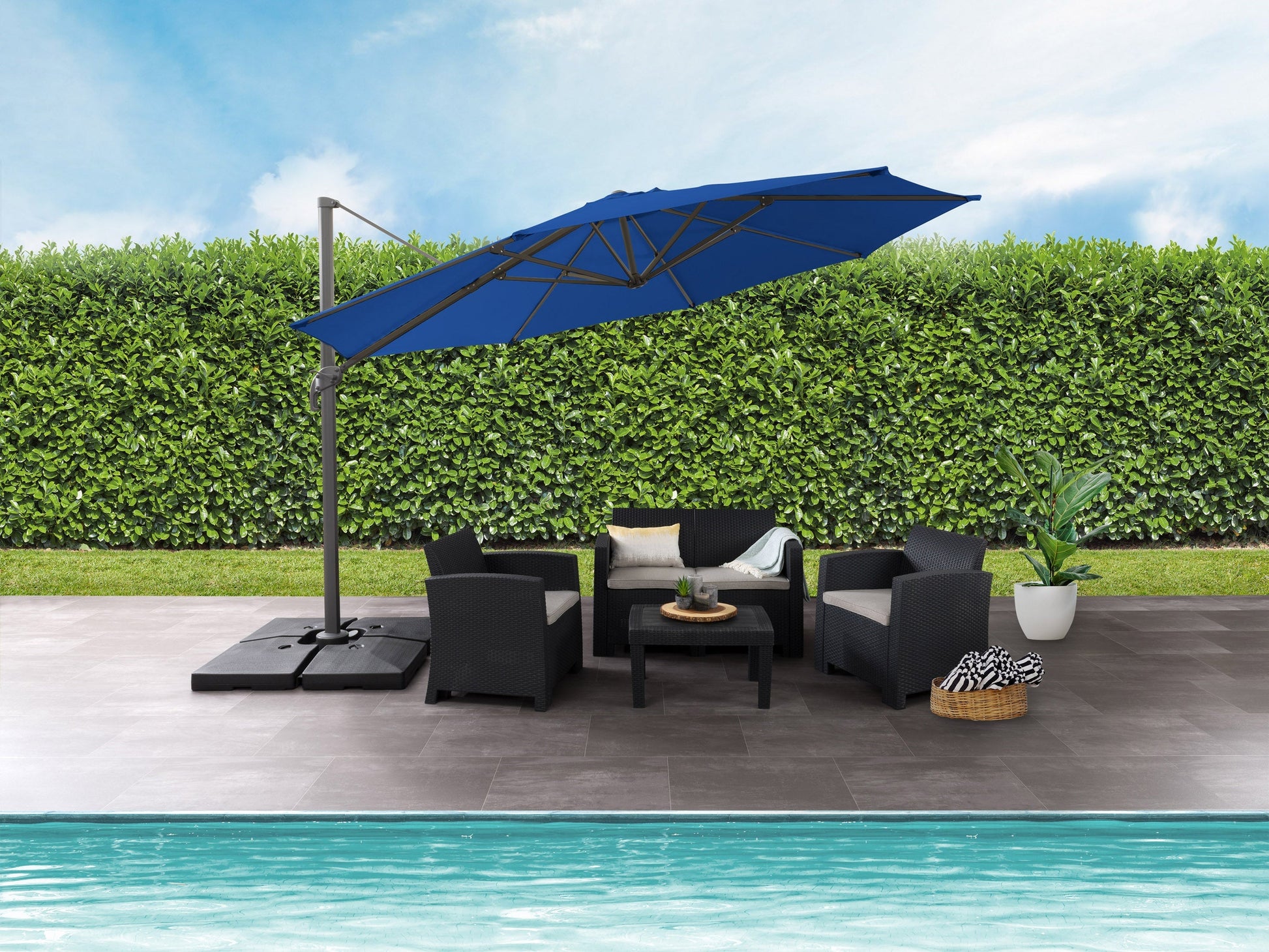 Deluxe 11.5ft offset patio umbrella in cobalt blue with sturdy aluminum frame and UV-resistant canopy.