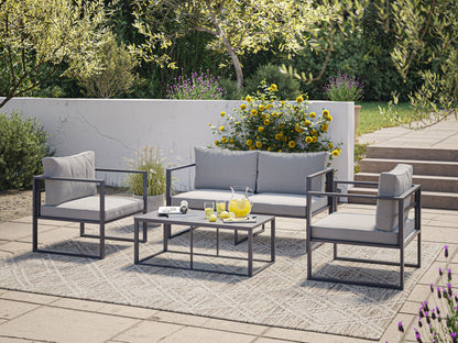 4-piece grey patio conversation set with cushions, rattan wicker frame, and glass-top coffee table.