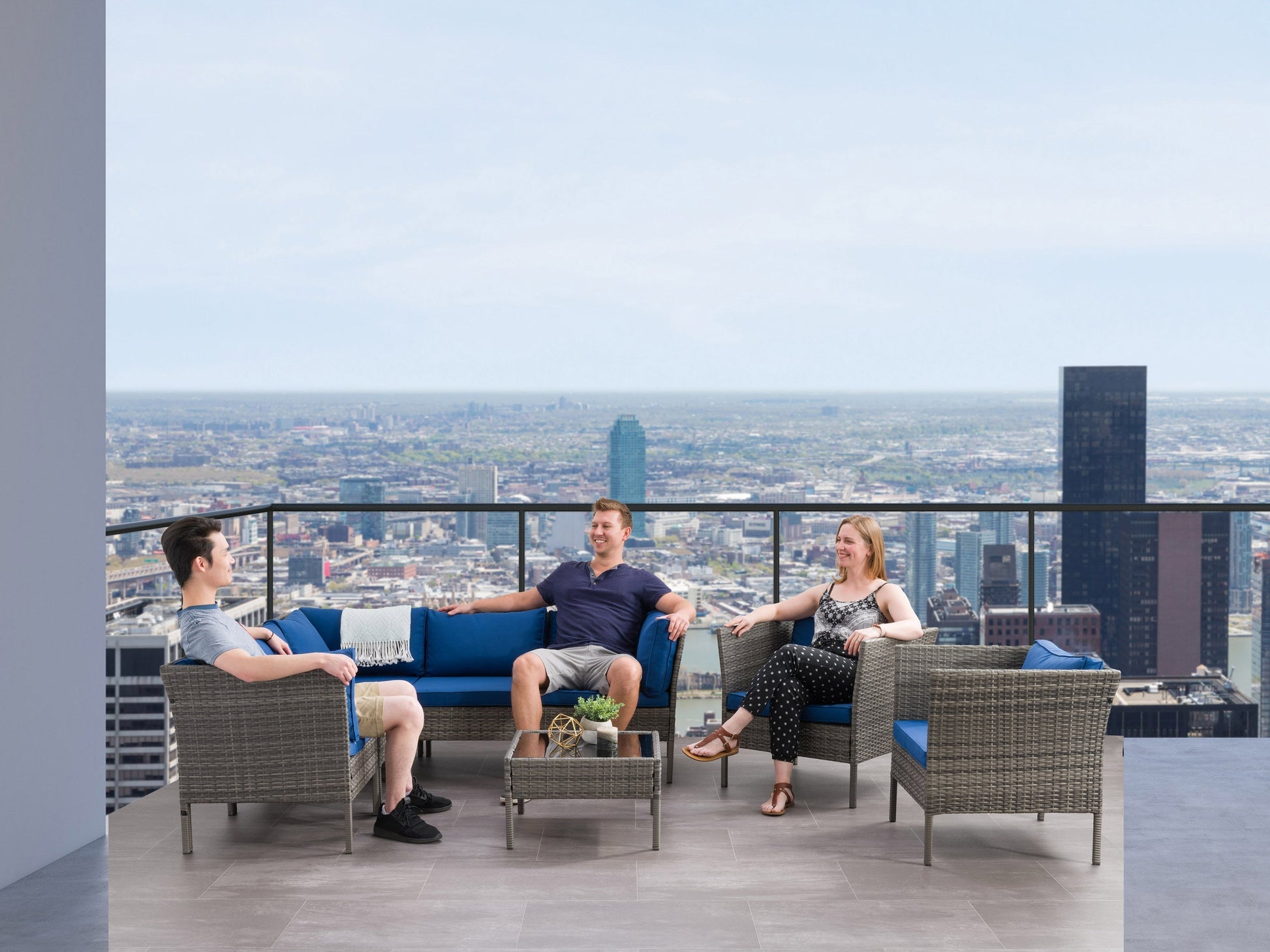 Grey and blue L-shaped outdoor sectional with cushions, 8-piece set, weather-resistant fabric, and modern design.