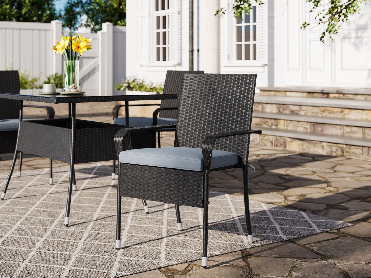 Stackable patio chairs, set of 2, grey fabric with black metal frame, outdoor seating, modern design.